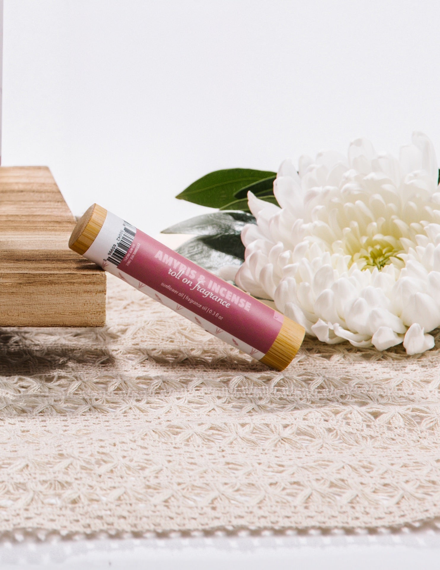 Lifestyle Photo of Amyris & Incense Roll on Fragrance