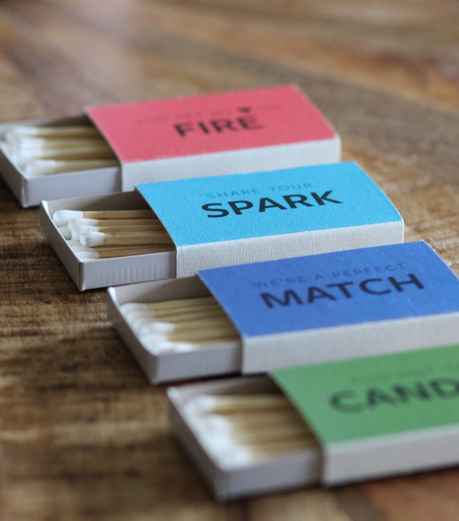 Multi Colored Match Boxes in a row