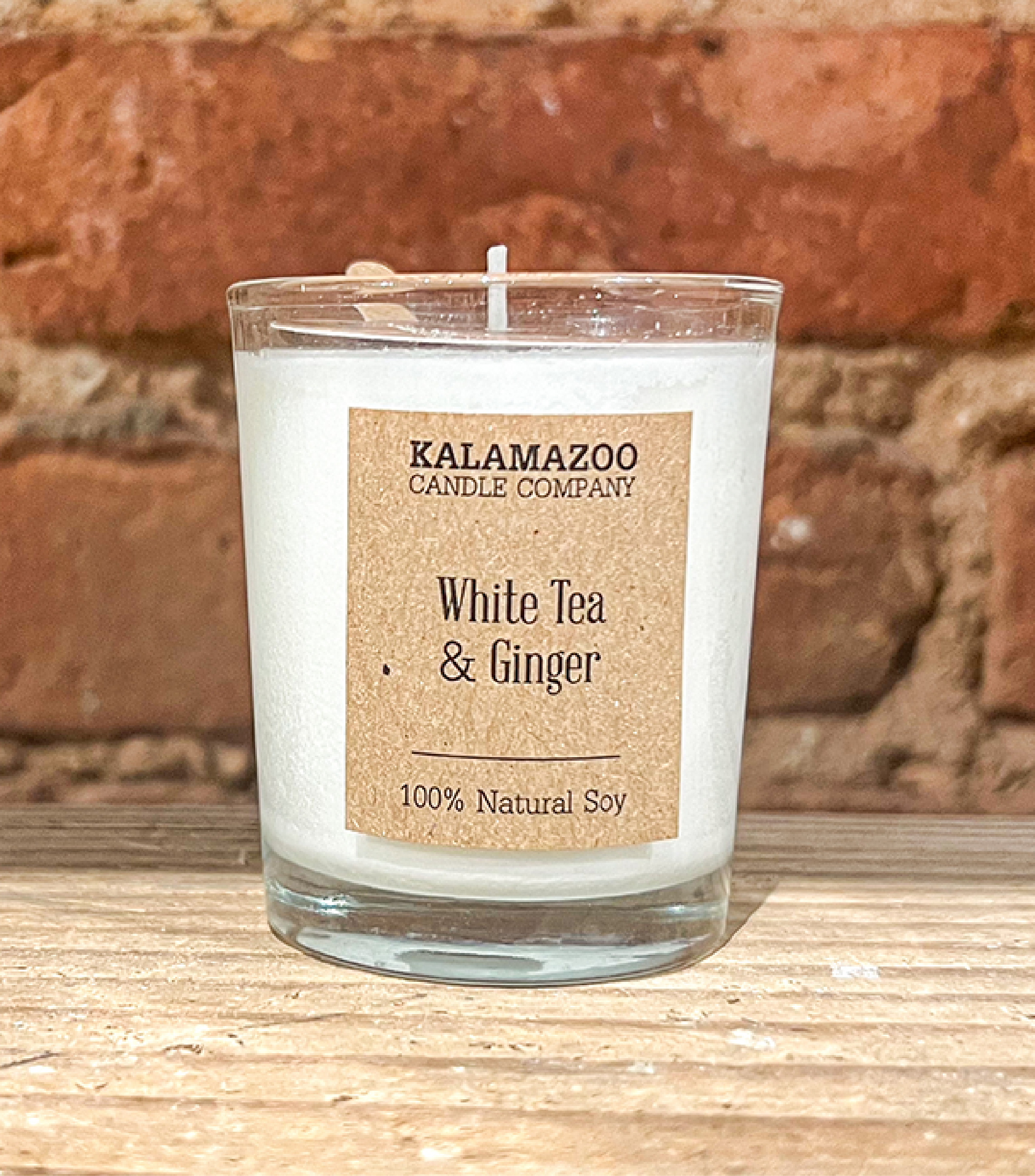 A Votive sized White Tea & Ginger Candle.