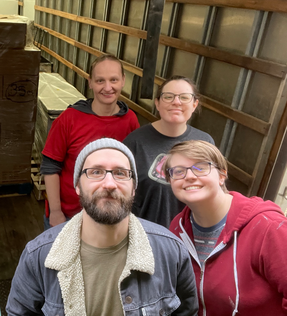 A team of candlemakers at the warehouse