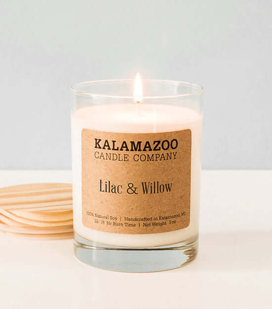 Lilac & Willow Candles Like spring rain dripping from flower blossoms, this soy candle has notes of pink lilac, jasmine, cherry blossom, and bergamot freshened with green willow. All Kalamazoo Candles are: 100% natural scented soy wax; produced using loca