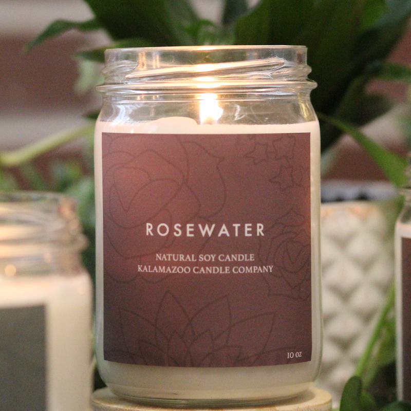 A burning Rosewater Candle