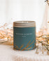 A Large Blue Tin With Jasmine on the sides. Made In The USA In Kalamazoo, MI. Scented with Orange, Frosted Lemon, and Pear Skin.