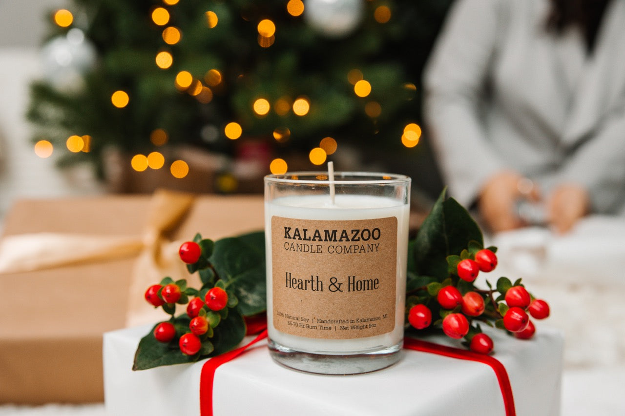 Hearth & Home Candle on a gift box.