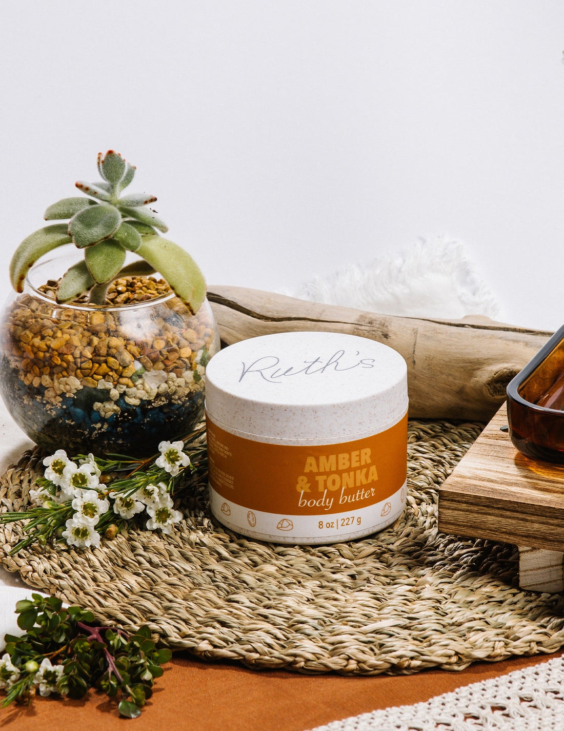 Lifestyle photo of an Amber &amp; Tonka Body Butter