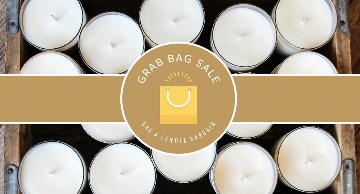 A Box of candles with Grab Bag Logo