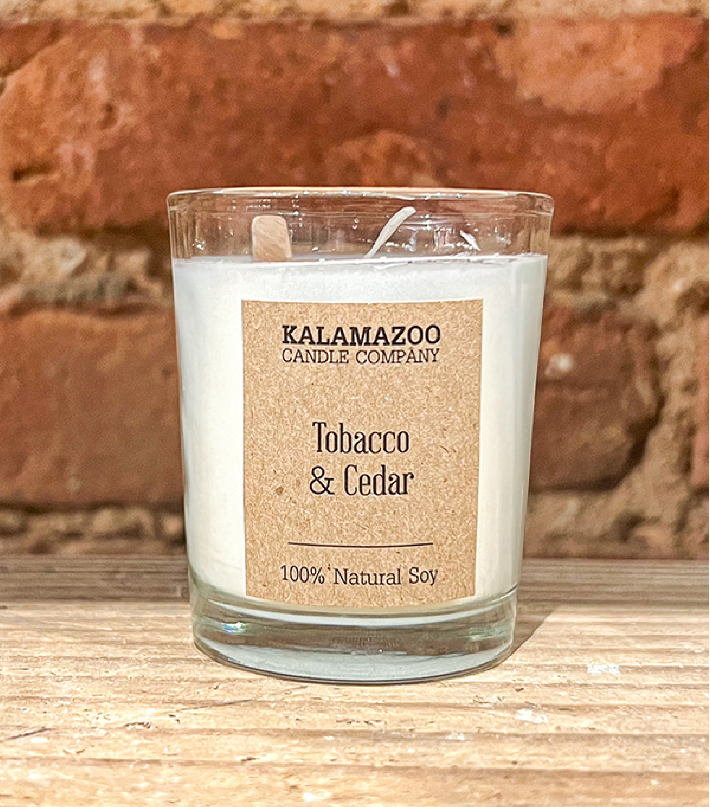 Tobacco Cedar Candles Come home to the scent of warm tobacco and cedar. Each classic jar candle is hand-poured in Kalamazoo, Michigan, using 100% soy wax. The perfect holiday gift!