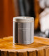 A Large Grey tin with birch trees on the side. Made in the USA In Kalamazoo, MI. Scented with Bergamot Leaf, Lemon, and Clary Sage.
