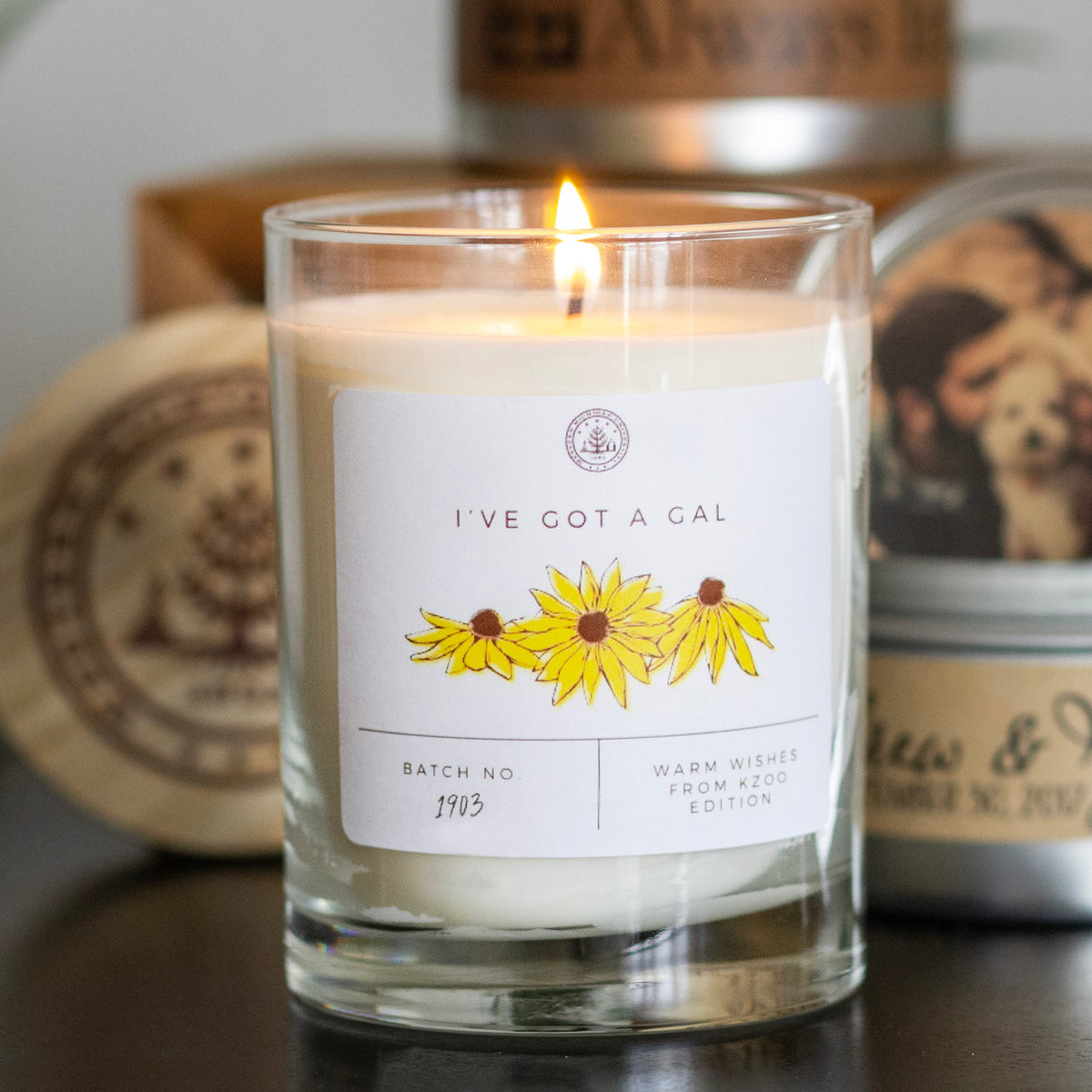 Custom label soy candle with a sunflower label design