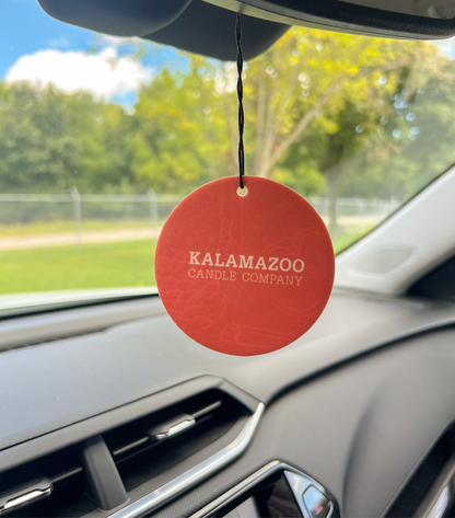 The Back of an Arboretum Car Freshener Hanging in a car.