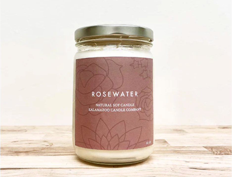 Rosewater Candle on a wooden table