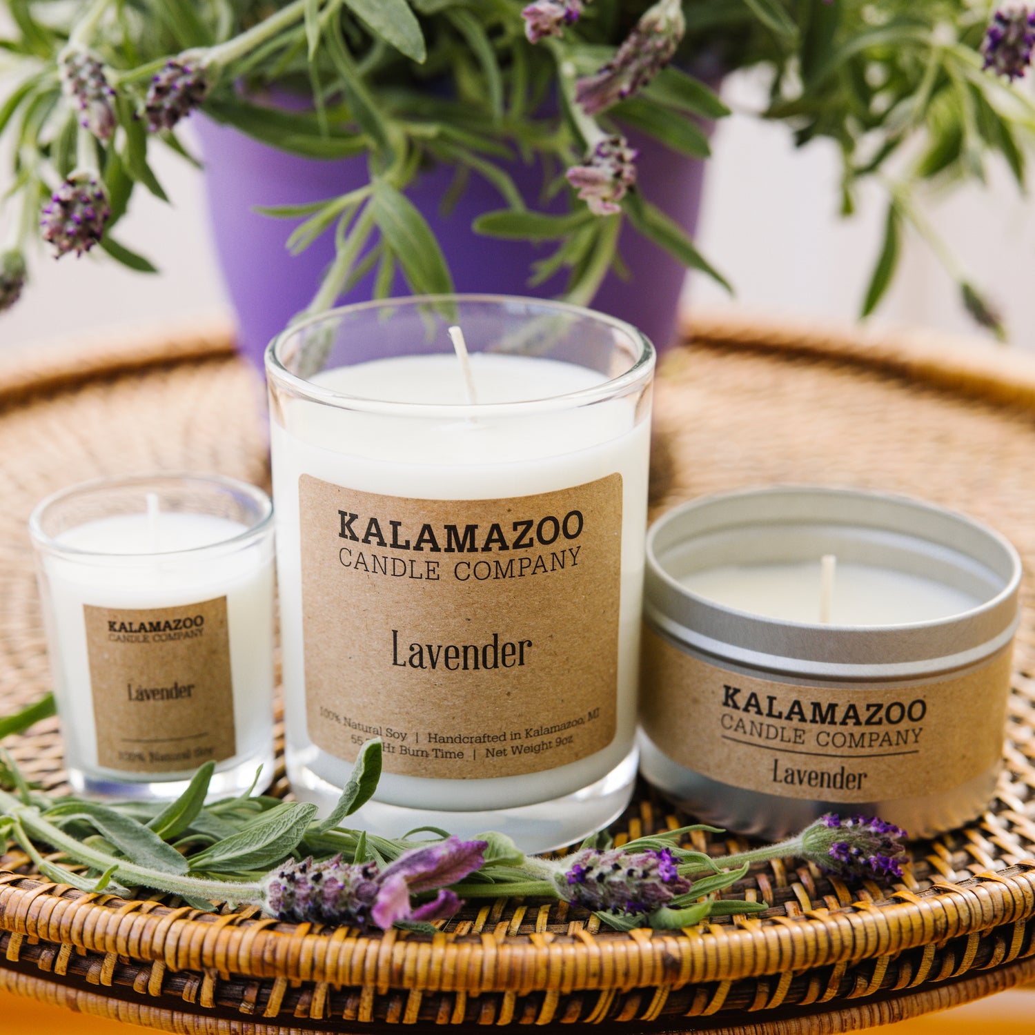 Image showing 3 lavender candles on a clean table.
