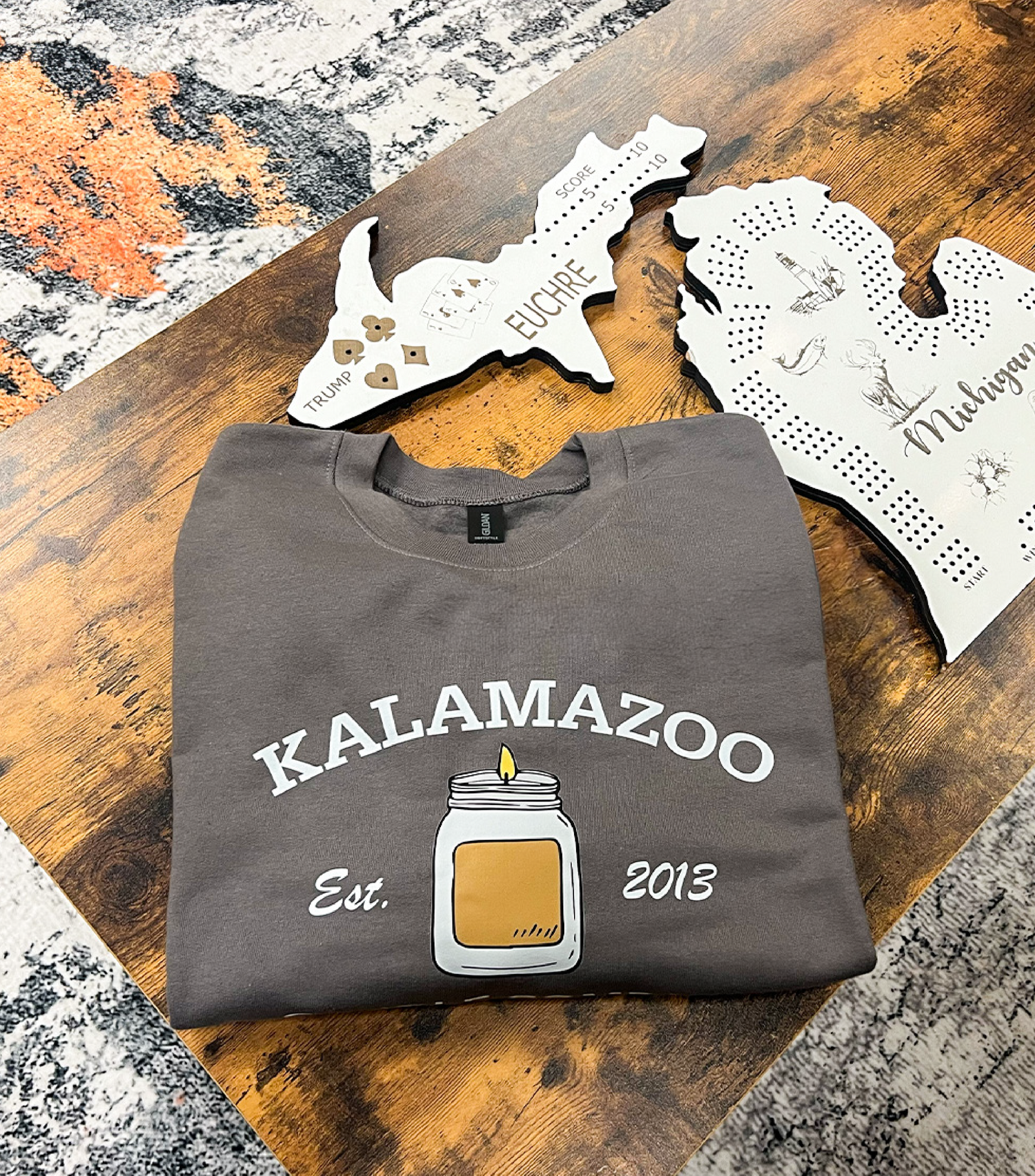A Gray Kalamazoo Candle Company Sweatshirt