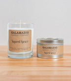 Fragrant spruce, bundled with white pine and Douglas fir, brightened by tart raspberries and juicy mandarins, and mellowed by vanilla bean and eucalyptus. Handmade in Kalamazoo, MI.