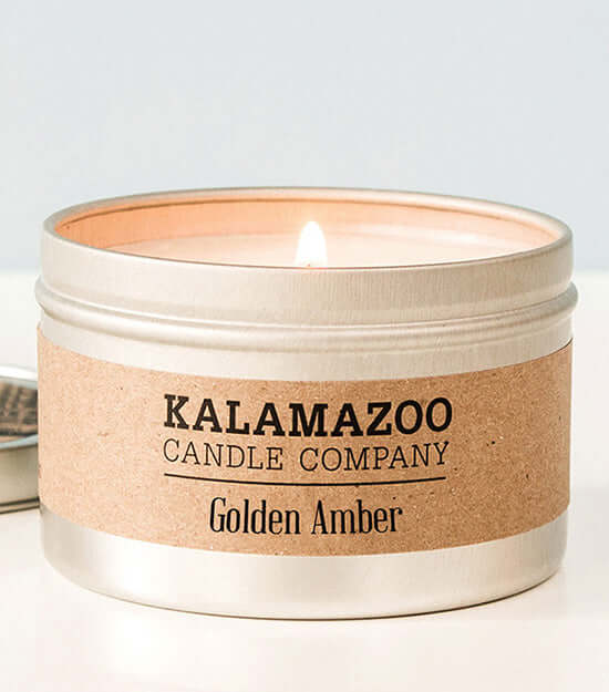 Golden Amber Candles Warm, rich, and welcoming, ancient resins and exotic woods are brightened by golden citrus in this soy candle with notes of amber, vanilla, and orange zest. All Kalamazoo Candles are: 100% natural scented soy wax; produced using local