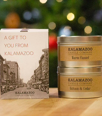 A Kalamazoo Candle Gift Box with a warm flannel and Balsam &amp; Cedar tin.