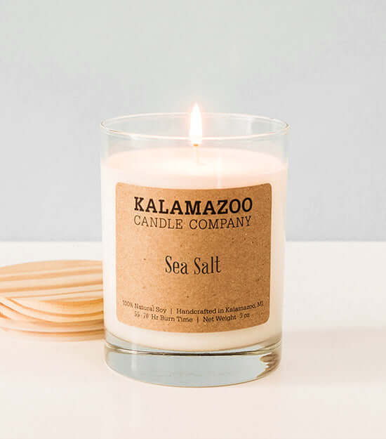 Sea Salt Candles Clean coastal ocean mists mingle with hints of coconut, lemon and white tea in this fresh soy candle that smells like sun warmed sea spray on a sunny day. All Kalamazoo Candles are: 100% natural scented soy wax; produced using locally sou